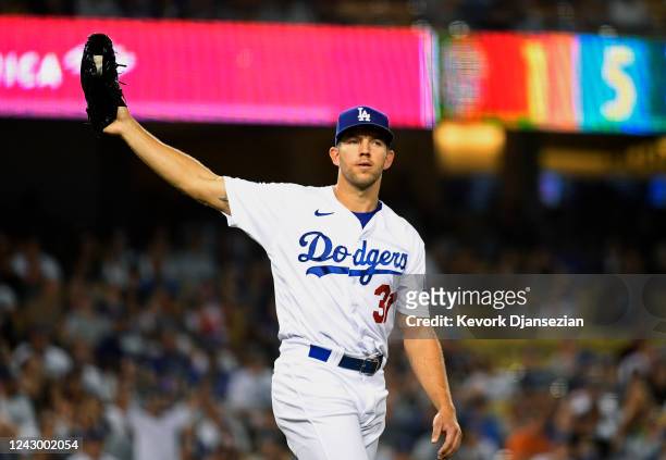 Starter Tyler Anderson of the Los Angeles Dodgers reacts after giving up a two-run home run to Brandon Crawford of the San Francisco Giants in the...