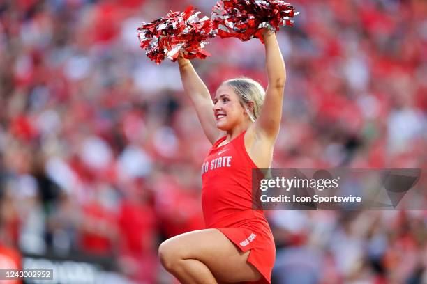 An Ohio State Buckeyes cheerleader on the sideline prior to the college football game between the Notre Dame Fighting Irish and Ohio State Buckeyes...