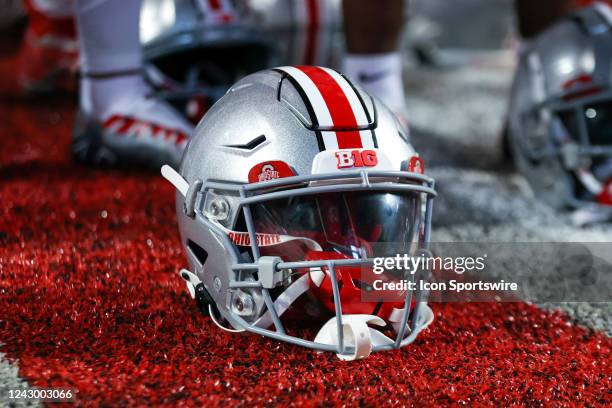 An Ohio State Buckeyes helmet on the turf following the college football game between the Notre Dame Fighting Irish and Ohio State Buckeyes on...