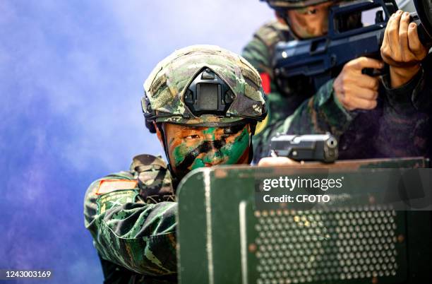 Special combat team members during actual combat training in Qinzhou City, Guangxi Zhuang autonomous Region, China, Sept 6, 2022.