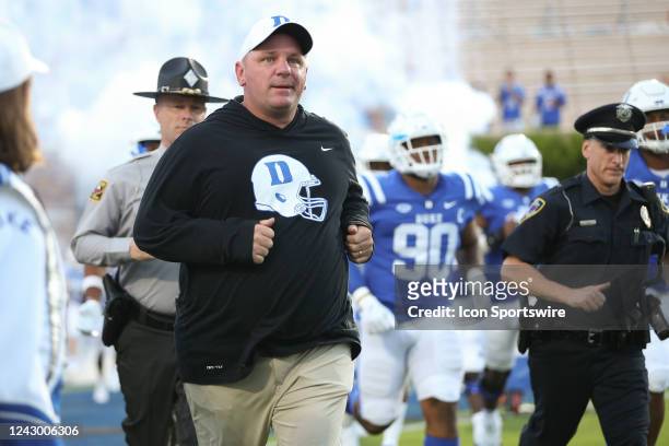 Duke Blue Devils head coach Mike Elko takes the field during the college football game between the Duke Blue Devils and the Temple Owls on September...