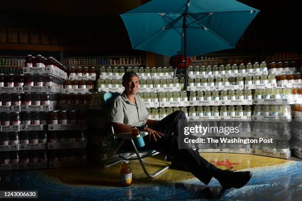 Seth Goldman, founder of Honest Tea, sits in front of a large display of his product at Whole Foods. Goldman sold his company a few years ago to...