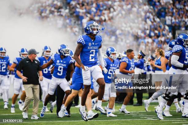 Kentucky wideout Barion Brown runs onto the field before Saturday&apos;s win against Miami , Sept. 3, 2022.