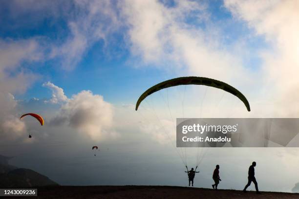 People paragliding over the sea at Mount Babadag in Fethiye district of Mugla, Turkiye on September 04, 2022.