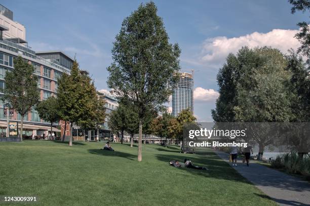 Visitors on the banks of the River Danube outside the Eurovea development in Bratislava, Slovakia, on Monday, Sept. 5, 2022. Slovakia's...