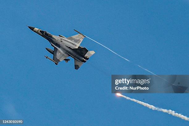 Taiwanese IDF fighter jet fires flares while maneuvering during the 2-day live-fire drill, amid intensifying threats military from China, in Pingtung...