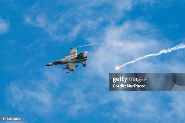 Taiwanese IDF fighter jet fires flares while maneuvering during the 2-day live-fire drill, amid intensifying threats military from China, in Pingtung...