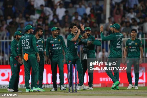 Pakistan's Naseem Shah celebrates with teammates after bowling out Afghanistan's captain Mohammad Nabi during the Asia Cup Twenty20 international...