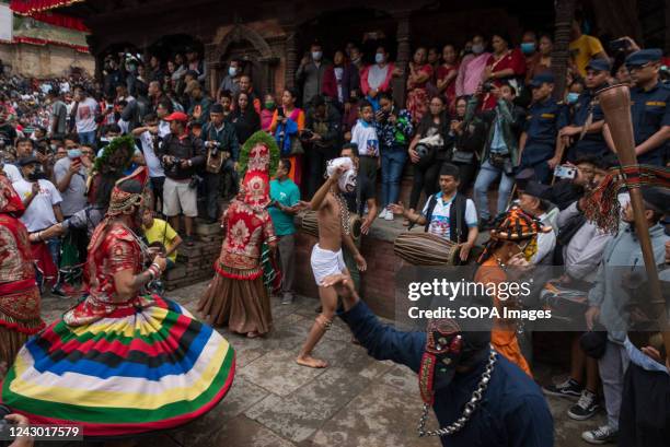 Traditional Nepali masked dancers perform the ritual dance during the first day of Indra Jatra. The annual festival, named after Indra, the god of...