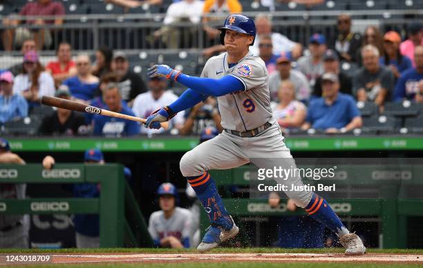 Brandon Nimmo of the New York Mets singles in the first inning during Game One of a doubleheader against the Pittsburgh Pirates at PNC Park on...