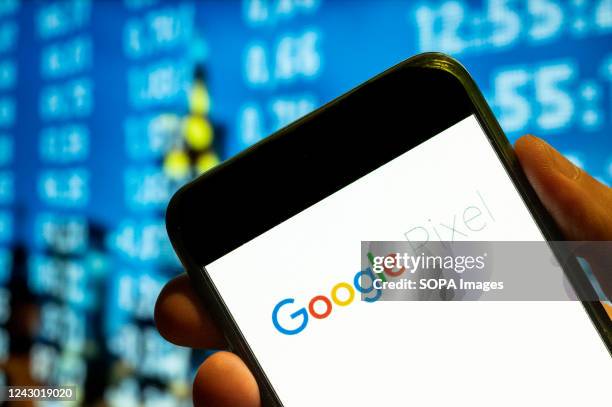 In this photo illustration, the American android consumer electronic devices developed by Google, Google Pixel logo is displayed on a smartphone...
