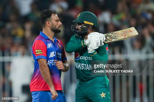 Pakistan's Asif Ali and Afghanistan's Fareed Ahmad argue after a dismissal during the Asia Cup Twenty20 international cricket Super Four match...