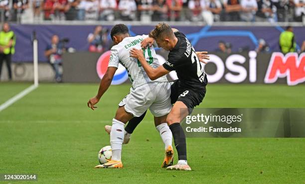 Marcus Edwards of Sporting CP in action with Jesper Lindström of Eintracht Frankfurt during the UEFA Champions League Group D match between Eintracht...