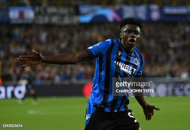 Club Brugge's defender Abakar Sylla celebrates after scoring a goal during the UEFA Champions League group stage football match between Bruges and...