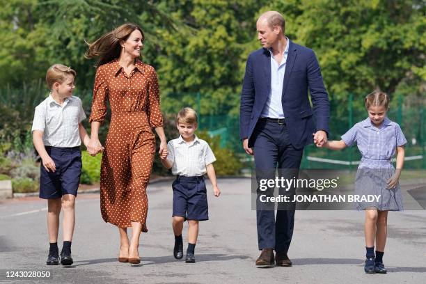 Britain's Prince George of Cambridge, Britain's Catherine, Duchess of Cambridge, Britain's Prince Louis of Cambridge, Britain's Prince William, Duke...