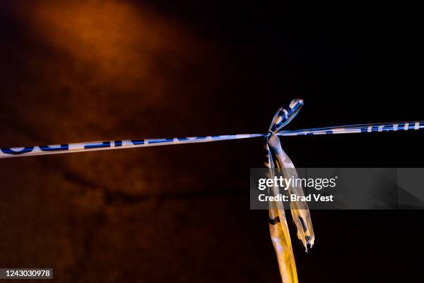 Police investigate the scene of a reported carjacking reportedly connected to a series of shootings on September 7, 2022 in Memphis, Tennessee....