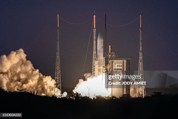 Photograph shows Arianespace's Ariane 5 rocket with EUTELSAT Konnect VHTS satellite onboard lifting up from the launchpad, at the Europes Spaceport,...