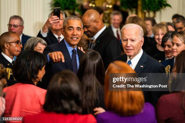 April 5, 2022: President Joe Biden and Former President Barack Obama greet visitors following remarks on the Affordable Care Act and lowering health...