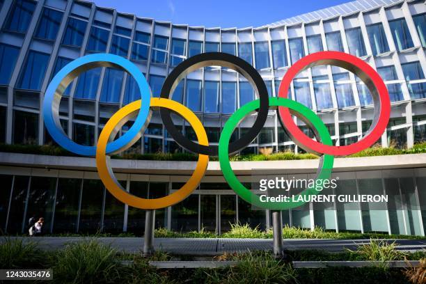 This photograph taken on September 8 shows the Olympic Rings during the opening of the executive board meeting of the International Olympic Committee...