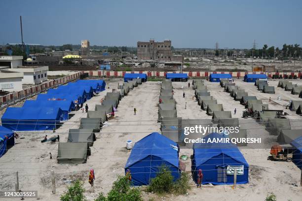 General view shows tents for internally displaced flood-affected people at a makeshift camp in Sukkur, Sindh province, on September 8, 2022. - Record...