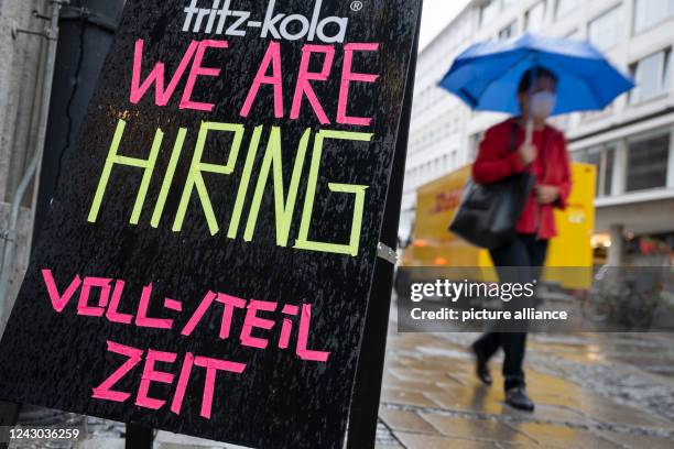 September 2022, Bavaria, Munich: A sign reading "We are Hiring - Full/Part Time" stands in the pedestrian mall downtown. Photo: Peter Kneffel/dpa