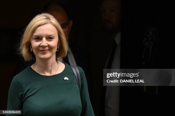 Britain's Prime Minister Liz Truss leaves the 10 Downing Street, in London, for the House of Commons to announce her energy price plan, on September...