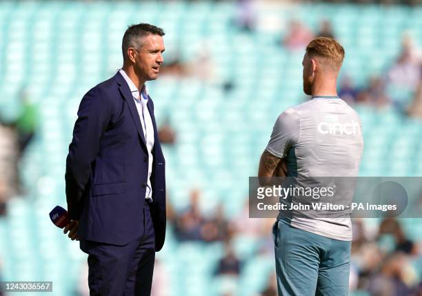 Former England cricketer Kevin Pietersen speaking with captain Ben Stokes on day one of the third LV= Insurance Test match at the Kia Oval, London....