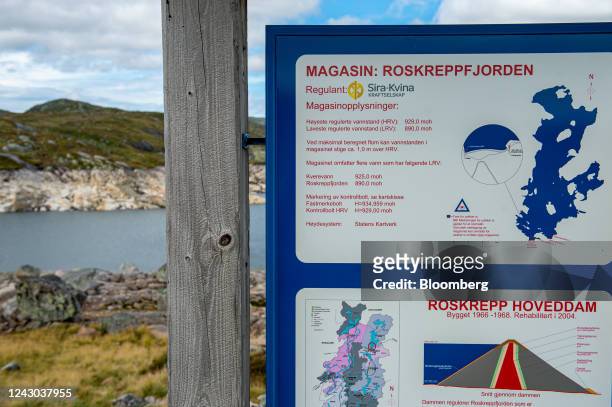 An information board at the Roskreppfjorden dam in Sirdal, Norway, on Wednesday, Sept. 7, 2022. Electricity production in the south of Norway, the...