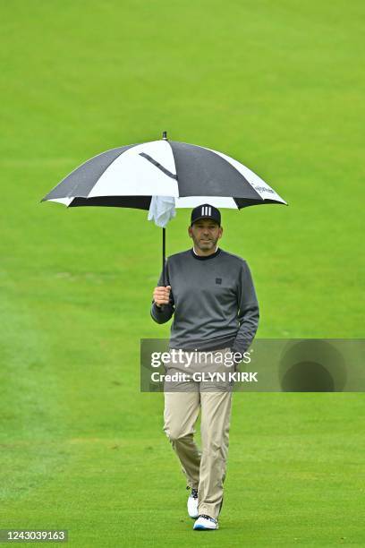 Spain's Sergio Garcia walks down the 7th fairway during his opening round on day 1 of the BMW PGA Championship at Wentworth Golf Club, south-west of...