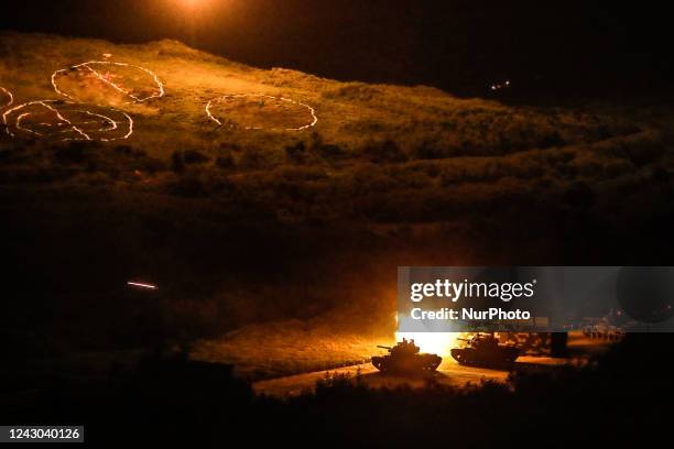 Tanks fire projectiles during a Taiwanese military live-fire drill, after Beijing increased its military exercises near Taiwan, in Pingtung, Taiwan,...