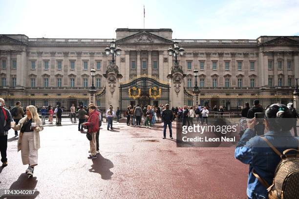 Members of the public outside of Buckingham Palace on September 8, 2022 in London, England. Buckingham Palace issued a statement earlier today saying...