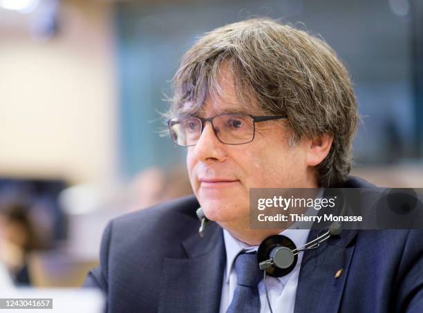 Spanish Member of the European Parliament Carles Puigdemont i Casamajó is listening during a session of the Committee of Inquiry to investigate the...