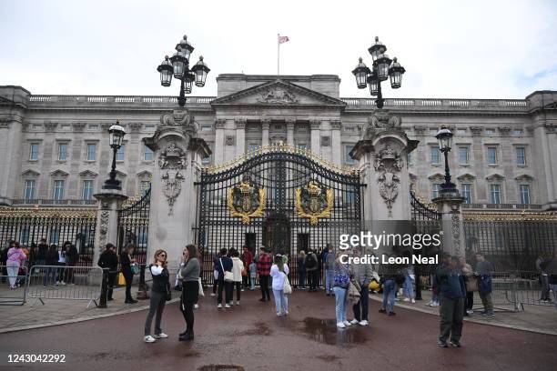 Members of the public outside the gates of Buckingham Palace on September 8, 2022 in London, England. Buckingham Palace issued a statement earlier...