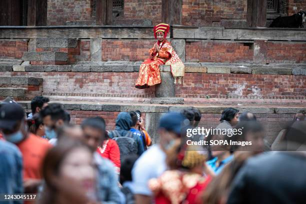 Young girl dressed as the Living Goddess Kumari is seen in the Kumari Puja festival at Hanuman Dhoka, Kathmandu Durbar Square. The annual festival,...