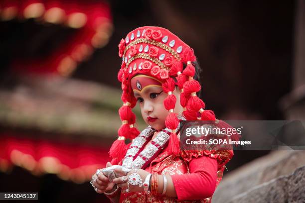 Young girl dressed as the Living Goddess Kumari takes part in the Kumari Puja festival at Hanuman Dhoka, Kathmandu Durbar Square. The annual...