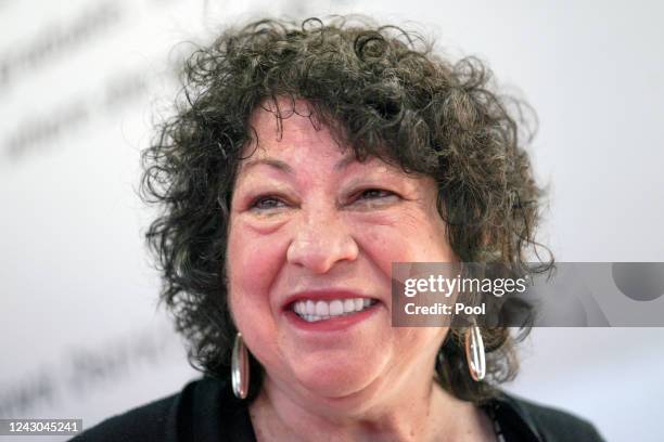 Supreme Court Associate Justice Sonia Sotomayor speaks with attendees after the unveiling of a sculpture of herself at the Bronx Terminal Market on...