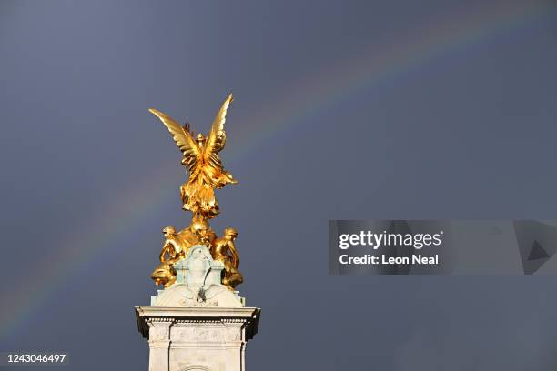 Rainbow is seen behind the Victoria Memorial in front of Buckingham Palace following the death today of Queen Elizabeth II in Balmoral, on September...