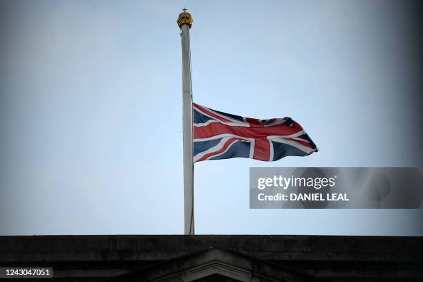 Union flag flies at at half mast atop Buckingham Palace in central London after it was announced that Queen Elizabeth II has died, in central London...