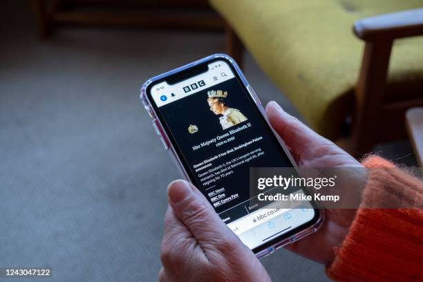 In this photo illustration BBC News announces the death of Queen Elizabeth II on a smartpthe hone screen at a home in the Midlands on 8th September...