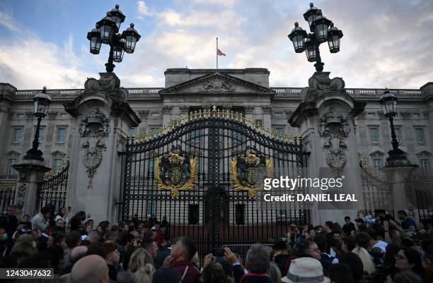 Union flag flies at half mast atop Buckingham Palace after the announcement that Queen Elizabeth II had died, in central London on September 8, 2022....