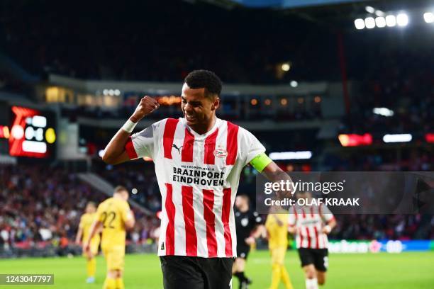 S Dutch forward Cody Gakpo celebrates after scoring the 1-1 goal during the UEFA Europa League Group A first leg football match between PSV Eindhoven...