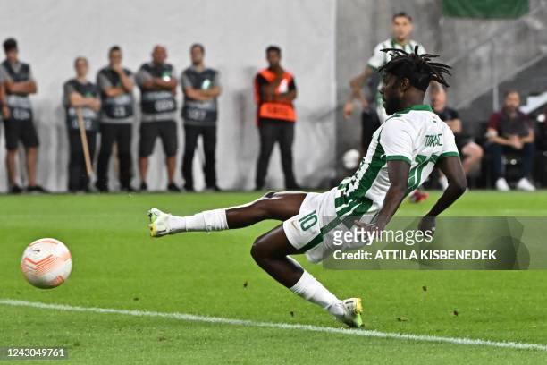 Ferencvaros Norwegian forward Tokmac Nguen scores a goal during the UEFA Europa League Group H football match between Ferencvaros TC and Trabzonspor...
