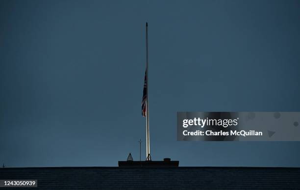 The Union Jack is seen at half mast at Hillsborough castle, Her Majesty the Queens place of residence whilst visiting the province following the news...