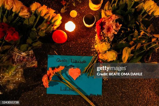 Candles, flowers and a card have been placed outside the British embassy in Oslo after the annoucement of the death of Queen Elizabeth II, on...