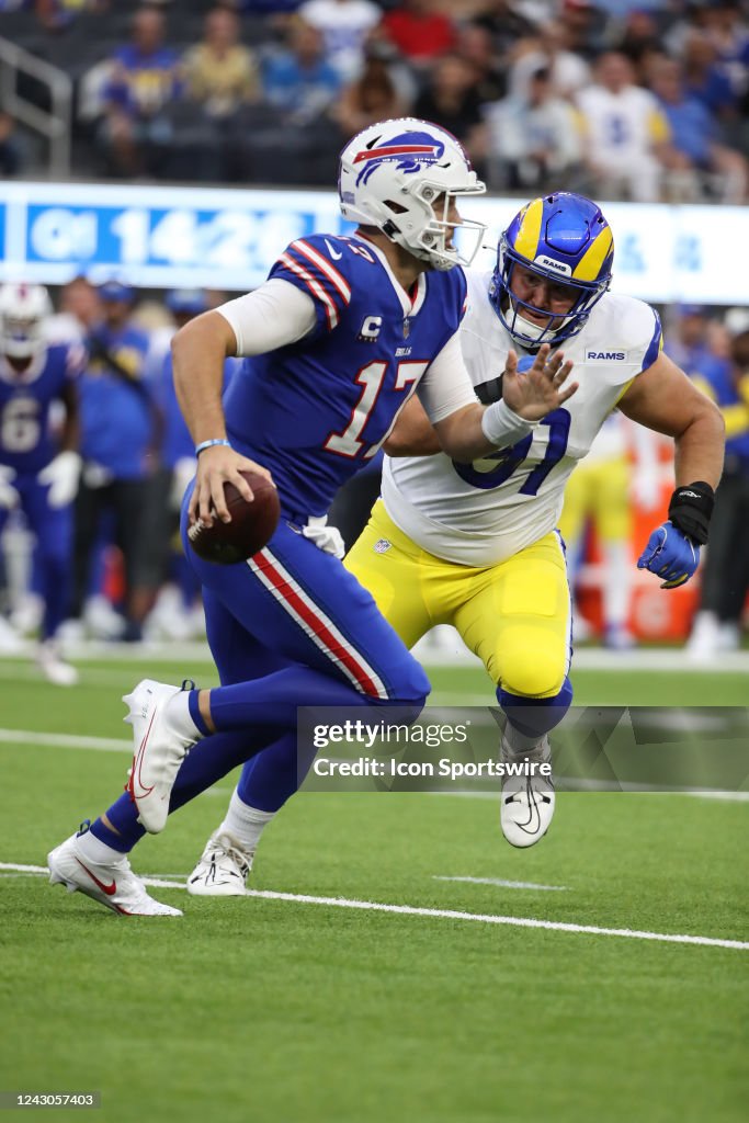 Josh Allen Rams Buffalo Bills quarterback Josh Allen breaks the pocket during the NFL ...