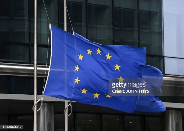 European flag flies at half-mast during a meeting of EU energy ministers to find solutions to rising energy prices at the EU headquarters in Brussels...
