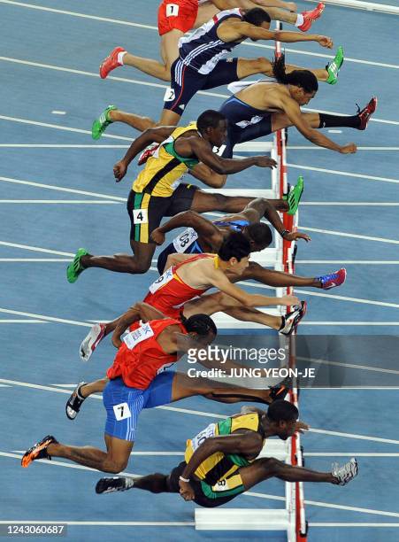 Jamaica's Andrew Riley, Cayman Islands's Ronald Forbes, China's Jiang Fan, US athlete David Oliver, Jamaica's Dwight Thomas, US athlete Jason...