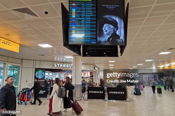 Screen displays a tribute to Queen Elizabeth II at Glasgow Airport on September 9, 2022 in Glasgow, United Kingdom. Elizabeth Alexandra Mary Windsor...