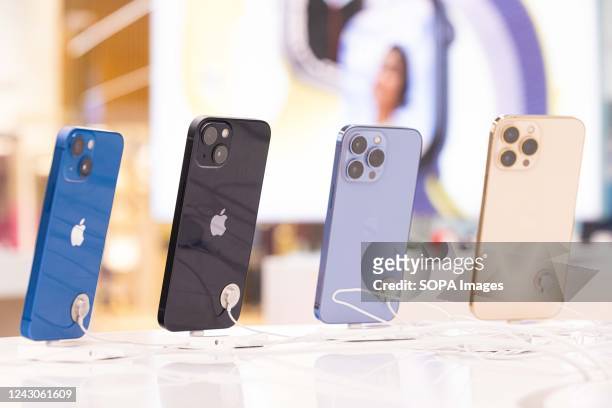 Apples iPhone 13 lineup on display inside an electronics store in Bratislava. Apple has announced during their presentation of the new iPhone 14,...