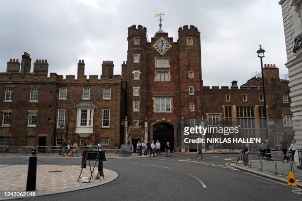 People gather outside of St James's Palace in London on September 9 a day after Queen Elizabeth II died at the age of 96. - Queen Elizabeth II, the...